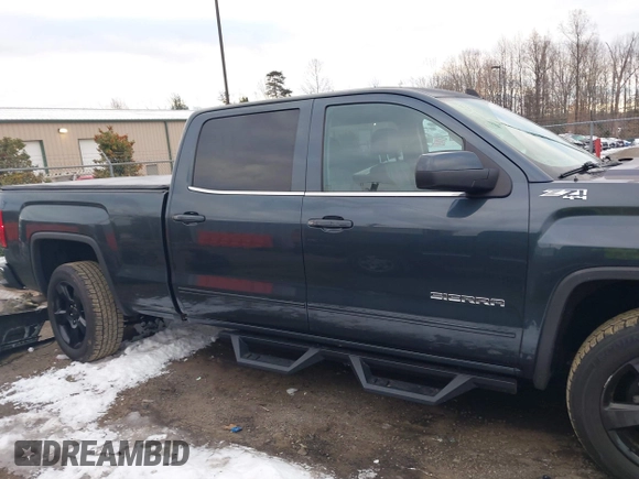 2017 GMC Sierra 1500 SLE with VIN 3GTU2MEC6HG319366, listed as a IAAI auction lot 41351311 with 123,097 mi miles and . Bid and sale history available at DreamBid. Image 13.