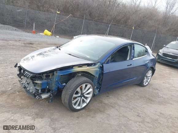2019 Tesla Model 3 Long Range with VIN 5YJ3E1EB2KF194209, listed as a IAAI auction lot 41610710 with 61,588 mi miles. Bid and sale history available at carsss.com. Image 19.