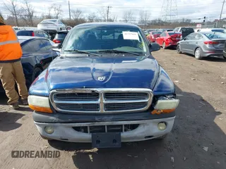 2004 Dodge Dakota SLT with VIN 1D7HG42N44S519910, listed as a IAAI auction lot 41737881 with 154,008 mi miles. Bid and sale history available at carsss.com. Image 12.