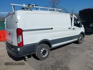 2020 Ford Transit Cargo with VIN 1FTBR1Y8XLKA84383, listed as a IAAI auction lot 41519121 with 61,410 mi miles and . Bid and sale history available at DreamBid. Image 4.