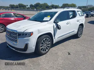 2021 GMC Acadia Denali with VIN 1GKKNPLS9MZ124774, listed as a IAAI auction lot 41859968 with 46,592 mi miles and . Bid and sale history available at carsss.com. Image 2.
