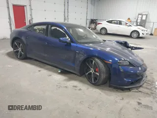 2020 Porsche Taycan 4S z VIN WP0AB2Y16LSA53420, wystawiony jako IAAI lot #41455821 z przebiegiem 25 296 mil mil oraz . Historia ofert i sprzedaży dostępna na DreamBid. Obrazek 1.