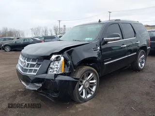 2013 Cadillac Escalade Platinum Edition with VIN 1GYS4DEF0DR260640, listed as a IAAI auction lot 41816127 with 152,649 mi miles. Bid and sale history available at carsss.com. Image 2.