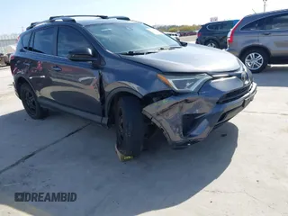 2018 Toyota RAV4 LE with VIN 2T3ZFREV4JW412661, listed as a IAAI auction lot 41781229 with 140,131 mi miles. Bid and sale history available at carsss.com. Image 1.