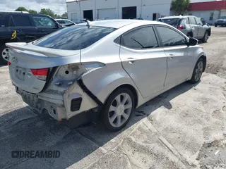 2013 Hyundai Elantra GLS with VIN KMHDH4AE4DU703817, listed as a IAAI auction lot 42377070 with 193,951 mi miles and . Bid and sale history available at DreamBid. Image 4.