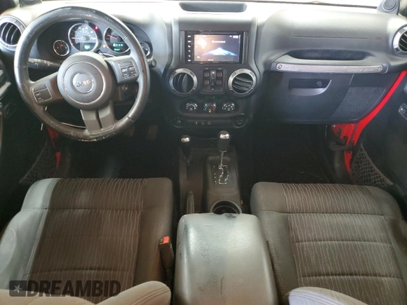 2012 Jeep Wrangler Unlimited Sport z VIN 1C4BJWDG2CL171531, wystawiony jako Copart lot #62181805 z przebiegiem 195 394 mil mil oraz Szkoda całkowita • Salvage title. Historia ofert i sprzedaży dostępna na DreamBid. Obrazek 8.