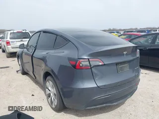 2023 Tesla Model Y Long Range with VIN 7SAYGDEE0PA036048, listed as a IAAI auction lot 41775845 with 41,291 mi miles. Bid and sale history available at carsss.com. Image 3.