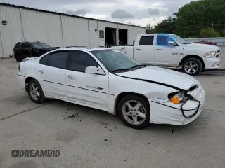 2000 Pontiac Grand Am GT with VIN 1G2NW52E2YM799735, listed as a Copart auction lot 51782455 with 181,850 mi miles and Salvage title. Bid and sale history available at DreamBid. Image 4.