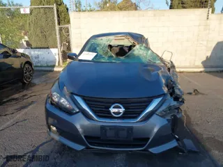 2016 Nissan Altima 2.5 S with VIN 1N4AL3APXGN392058, listed as a IAAI auction lot 41881691 with 218,804 mi miles. Bid and sale history available at carsss.com. Image 12.