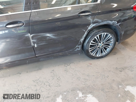 2018 BMW 5 Series 530i xDrive with VIN WBAJA7C55JWA73459, listed as a IAAI auction lot 41634921 with 64,759 mi miles and . Bid and sale history available at DreamBid. Image 17.