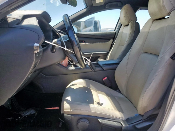 2019 Mazda 3 z VIN JM1BPAJM3K1131108, wystawiony jako Copart lot #57911165 z przebiegiem 65 641 mil mil oraz Szkoda całkowita • Salvage title. Historia ofert i sprzedaży dostępna na DreamBid. Obrazek 7.