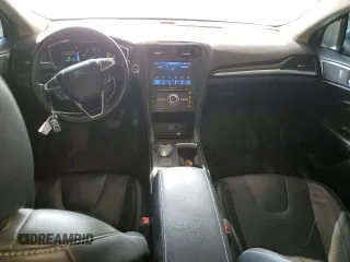 2020 Ford Fusion Titanium with VIN 3FA6P0RU5LR141507, listed as a Copart auction lot 64798205 with 113,216 mi miles and Salvage title. Bid and sale history available at DreamBid. Image 8.