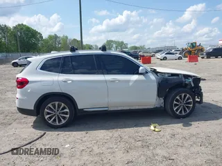 2019 BMW X3 sDrive30i z VIN 5UXTR7C51KLF33271, wystawiony jako IAAI lot #42102581 z przebiegiem 65 344 mil mil oraz . Historia ofert i sprzedaży dostępna na DreamBid. Obrazek 14.