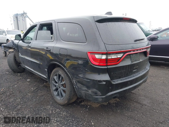 2017 Dodge Durango R/T with VIN 1C4SDJCTXHC878876, listed as a IAAI auction lot 42175360 with 61,323 mi miles and . Bid and sale history available at carsss.com. Image 3.