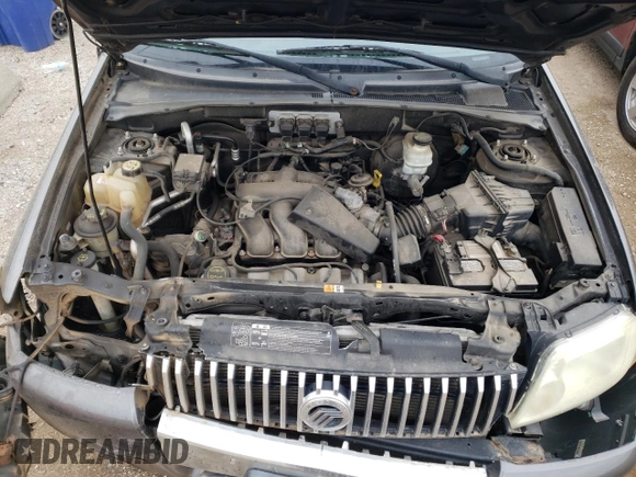 2005 Mercury Mariner Luxury z VIN 4M2YU57185DJ27043, wystawiony jako Copart lot #52980555 z przebiegiem 152 406 mil mil oraz Szkoda całkowita • Salvage title. Historia ofert i sprzedaży dostępna na DreamBid. Obrazek 11.