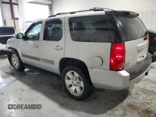 2010 GMC Yukon SLT with VIN 1GKUCCE07AR284702, listed as a Copart auction lot 71031564 with 113,708 mi miles and Salvage Title. Bid and sale history available at carsss.com. Image 2.
