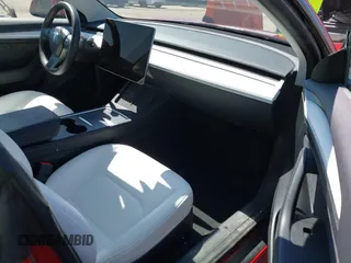 2023 Tesla Model 3 z VIN 5YJ3E1EA6PF566326, wystawiony jako IAAI lot #42687125 z przebiegiem 43 548 mil mil oraz . Historia ofert i sprzedaży dostępna na DreamBid. Obrazek 5.