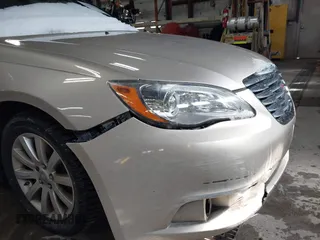 2014 Chrysler 200 Touring with VIN 1C3CCBBB8EN107990, listed as a IAAI auction lot 41878376 with 137,424 mi miles. Bid and sale history available at carsss.com. Image 6.