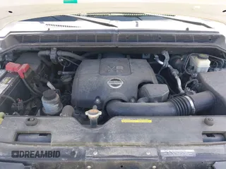 2014 Nissan Titan S with VIN 1N6AA0EC3EN502951, listed as a IAAI auction lot 41956309 with 128,464 mi miles and . Bid and sale history available at DreamBid. Image 10.
