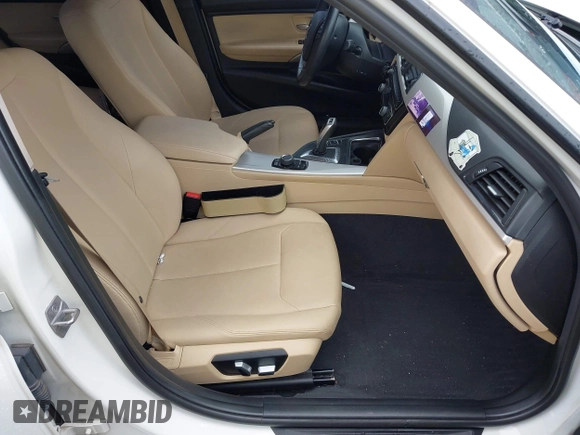2018 BMW 3 Series 320i xDrive with VIN WBA8E5G52JNU46803, listed as a IAAI auction lot 41869625 with 67,057 mi miles. Bid and sale history available at carsss.com. Image 5.