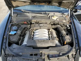 2006 Volkswagen Phaeton z VIN WVWAF03D268002733, wystawiony jako Copart lot #44980475 z przebiegiem 90 539 mil mil oraz Czysty tytuł • Clean title. Historia ofert i sprzedaży dostępna na DreamBid. Obrazek 11.