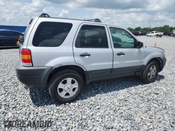 2003 Ford Escape XLT Popular with VIN 1FMYU03103KA06199, listed as a Copart auction lot 58731515 with 181,429 mi miles and Salvage title. Bid and sale history available at DreamBid. Image 3.