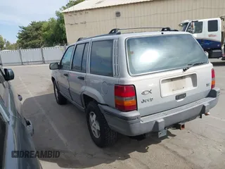 1994 Jeep Grand Cherokee Laredo with VIN 1J4GZ58YXRC325868, listed as a IAAI auction lot 42664900 with 220,149 mi miles and . Bid and sale history available at DreamBid. Image 3.