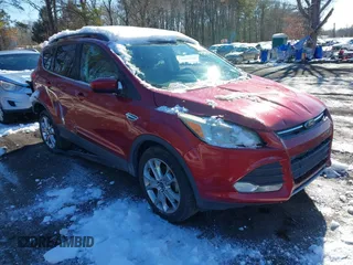 2014 Ford Escape SE with VIN 1FMCU0GX6EUA57609, listed as a IAAI auction lot 41533589 with 96,709 mi miles. Bid and sale history available at carsss.com. Image 1.