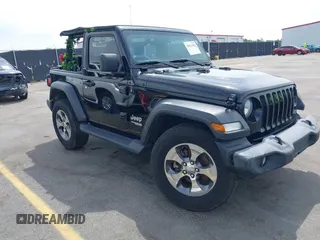 2018 Jeep Wrangler Sport S with VIN 1C4GJXAN8JW290064, listed as a IAAI auction lot 42012484 with 93,838 mi miles and . Bid and sale history available at DreamBid. Image 1.