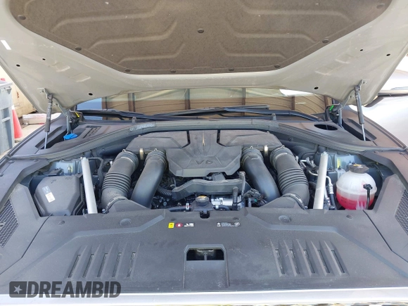 2023 Genesis GV70 Sport with VIN KMUMCDTC4PU098990, listed as a IAAI auction lot 42039386 with 32,090 mi miles and . Bid and sale history available at DreamBid. Image 10.