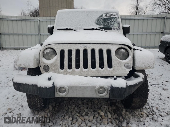 2014 Jeep Wrangler Sahara with VIN 1C4AJWBG5EL327823, listed as a Copart auction lot 85472404 with 136,132 mi miles and Clean Title. Bid and sale history available at DreamBid. Image 5.