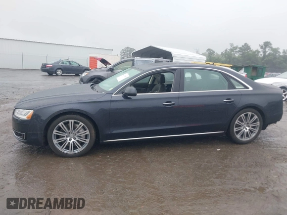 2015 Audi A8 4.0T with VIN WAU32AFD2FN026356, listed as a IAAI auction lot 42330082 with 44,857 mi miles and . Bid and sale history available at DreamBid. Image 14.