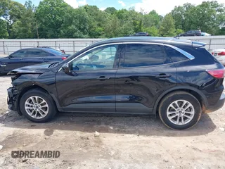 2020 Ford Escape SE z VIN 1FMCU0G65LUA92260, wystawiony jako IAAI lot #42244569 z przebiegiem 49 802 mil mil oraz . Historia ofert i sprzedaży dostępna na DreamBid. Obrazek 15.