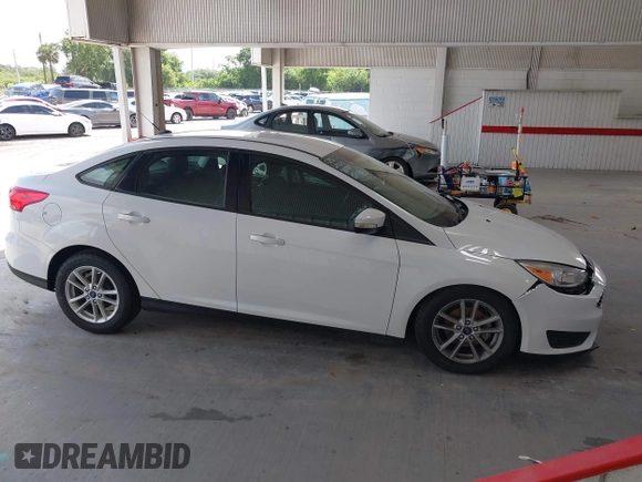 2017 Ford Focus SE with VIN 1FADP3F2XHL342823, listed as a IAAI auction lot 42496940 with 97,263 mi miles and . Bid and sale history available at DreamBid. Image 13.