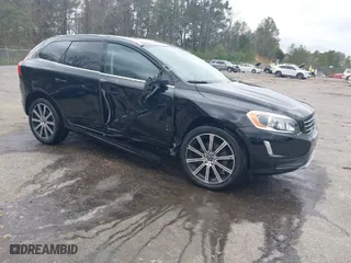 2016 Volvo XC60 T5 Drive-E Premier with VIN YV440MDK0G2857046, listed as a IAAI auction lot 41752649 with 36,896 mi miles. Bid and sale history available at carsss.com. Image 1.