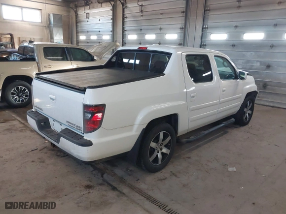 2014 Honda Ridgeline SE with VIN 5FPYK1F6XEB010582, listed as a IAAI auction lot 41641803 with 69,923 mi miles. Bid and sale history available at carsss.com. Image 4.