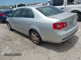2007 Volkswagen Jetta Wolfsburg Edition with VIN 3VWEF71K87M196027, listed as a IAAI auction lot 42804650 with 205,019 mi miles and . Bid and sale history available at DreamBid. Image 3.