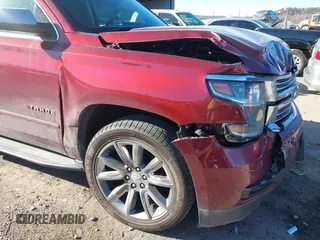 2016 Chevrolet Tahoe LTZ z VIN 1GNSKCKC9GR205745, wystawiony jako IAAI lot #41710241 z przebiegiem 94 931 mil mil oraz . Historia ofert i sprzedaży dostępna na DreamBid. Obrazek 6.
