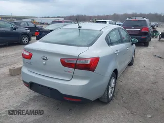 2014 Kia Rio EX with VIN KNADN4A36E6338670, listed as a IAAI auction lot 42035501 with 166,561 mi miles. Bid and sale history available at carsss.com. Image 4.