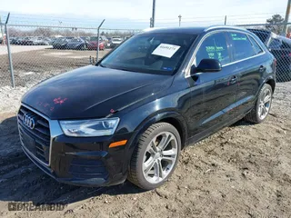 2016 Audi Q3 Premium Plus with VIN WA1EFCFS1GR011801, listed as a IAAI auction lot 41691273 with 126,554 mi miles. Bid and sale history available at carsss.com. Image 19.