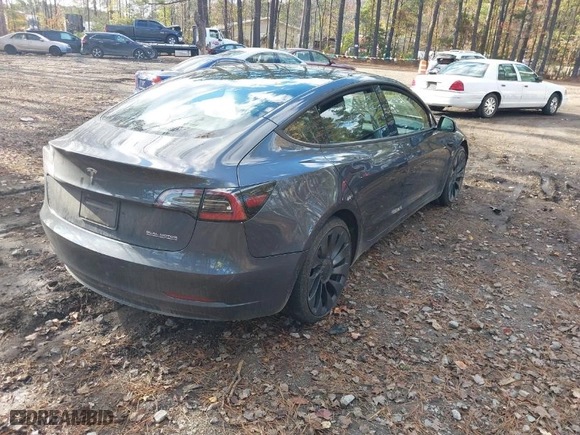 2022 Tesla Model 3 Performance with VIN 5YJ3E1EC5NF270082, listed as a IAAI auction lot 40930688 with 1 mi miles. Bid and sale history available at carsss.com. Image 4.