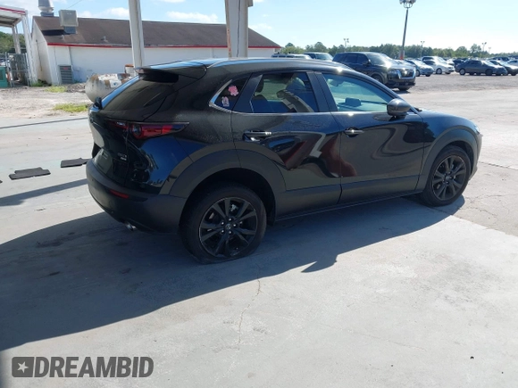 2022 Mazda CX-30 2.5 Turbo with VIN 3MVDMBAY3NM440688, listed as a IAAI auction lot 40860258 with 27,445 mi miles and . Bid and sale history available at DreamBid. Image 4.