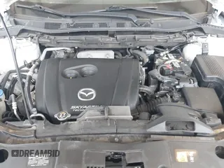 2016 Mazda CX-5 Grand Touring with VIN JM3KE2DYXG0675619, listed as a IAAI auction lot 42137144 with 106,262 mi miles and . Bid and sale history available at DreamBid. Image 10.