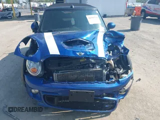 2013 MINI Convertible S with VIN WMWZP3C5XDT705613, listed as a IAAI auction lot 42392748 with 87,477 mi miles and . Bid and sale history available at DreamBid. Image 6.
