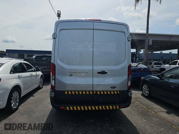 2017 Ford Transit Cargo z VIN 1FTYE1CMXHKA48291, wystawiony jako IAAI lot #42731289 z przebiegiem 142 973 mil mil oraz . Historia ofert i sprzedaży dostępna na DreamBid. Obrazek 5.
