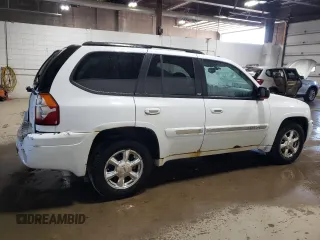 2005 GMC Envoy SLE z VIN 1GKDT13S452360609, wystawiony jako Copart lot #56188495 z przebiegiem 180 046 mil mil oraz Szkoda całkowita • Salvage title. Historia ofert i sprzedaży dostępna na DreamBid. Obrazek 3.