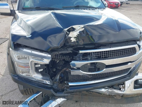 2018 Ford F-150 XL with VIN 1FTEW1EG5JFB83040, listed as a IAAI auction lot 40986539 with 62,988 mi miles. Bid and sale history available at carsss.com. Image 6.