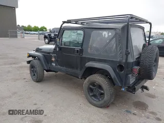 2000 Jeep Wrangler Sahara with VIN 1J4FA59S7YP805628, listed as a IAAI auction lot 42259201 with Not provided miles and . Bid and sale history available at DreamBid. Image 3.