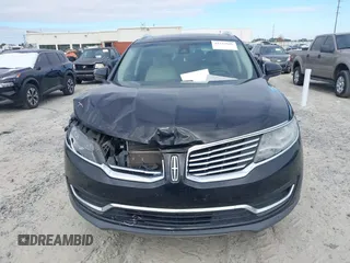 2017 Lincoln MKX Reserve with VIN 2LMPJ6LR0HBL16324, listed as a IAAI auction lot 41157696 with 118,028 mi miles. Bid and sale history available at carsss.com. Image 12.