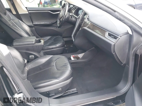 2013 Tesla Model S с VIN 5YJSA1AG2DFP11228, выставлен на аукционе IAAI как лот 41339370 с пробегом 121 237 миль миль и . История ставок и продаж доступна на DreamBid. Изображение 5.